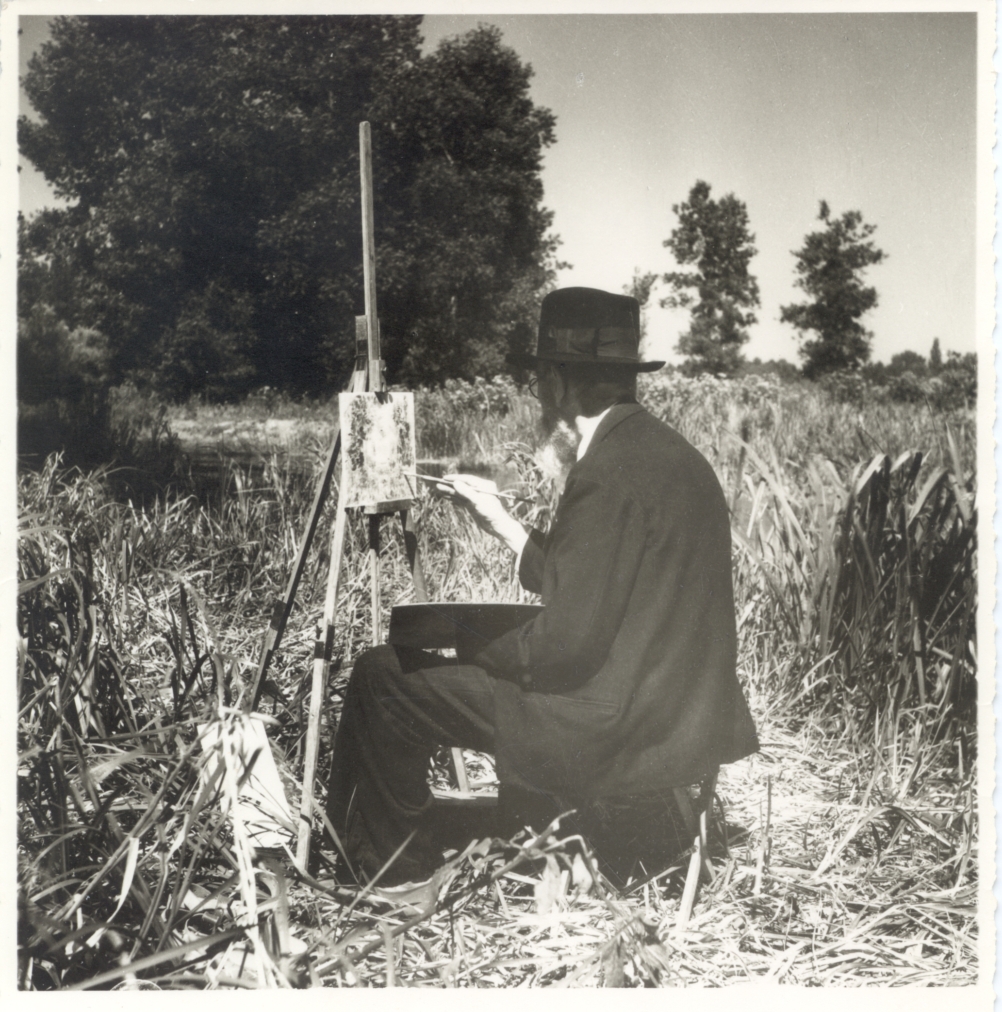 Paul Bocquet et son chevalet au champs de blé Paul Bocquet et son chevalet au champs de blé en été